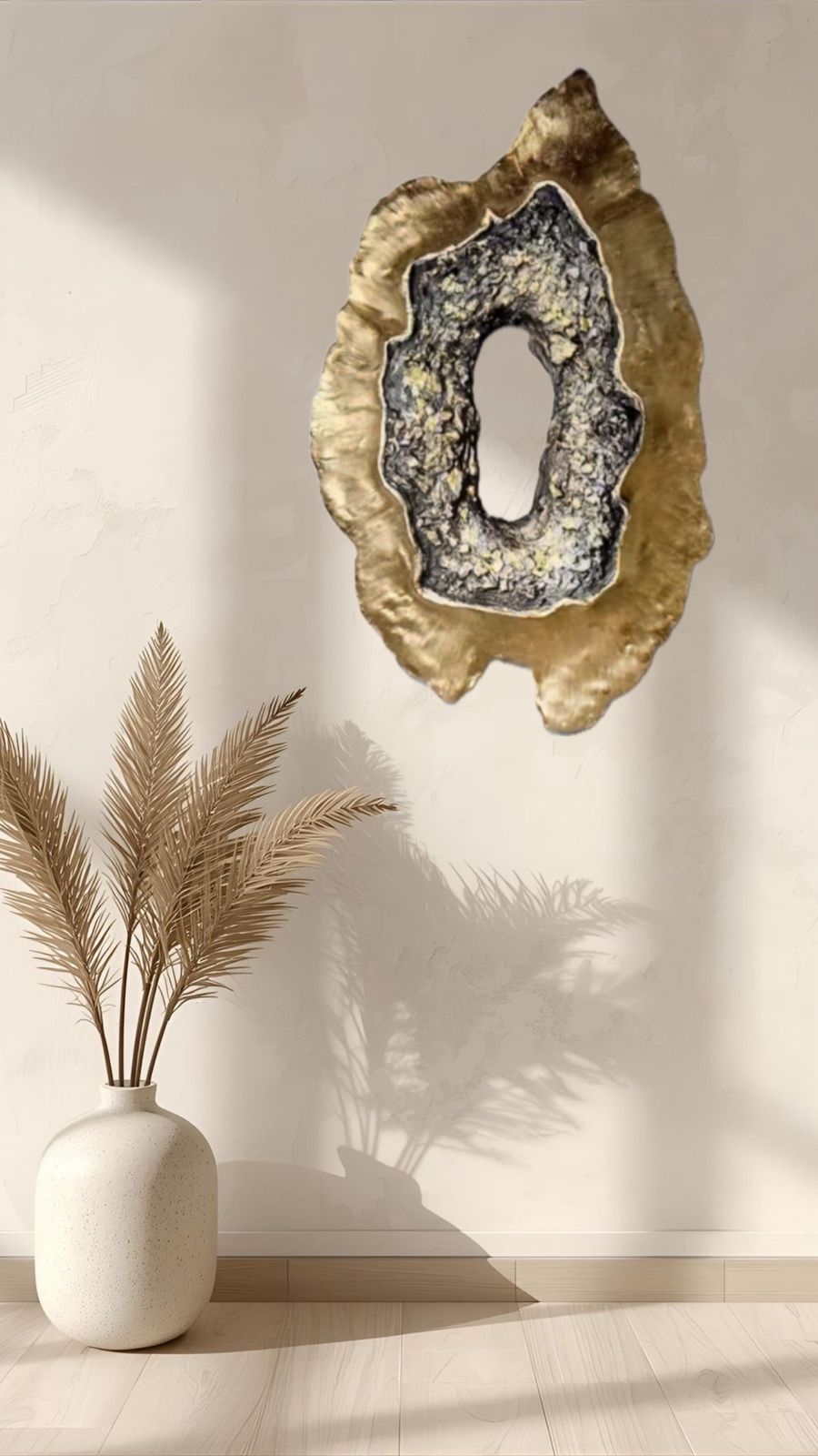 Luxury handcrafted geode-inspired gold textured wall sculpture mounted above a green velvet sofa in a modern living room – Arty Crafty wall art